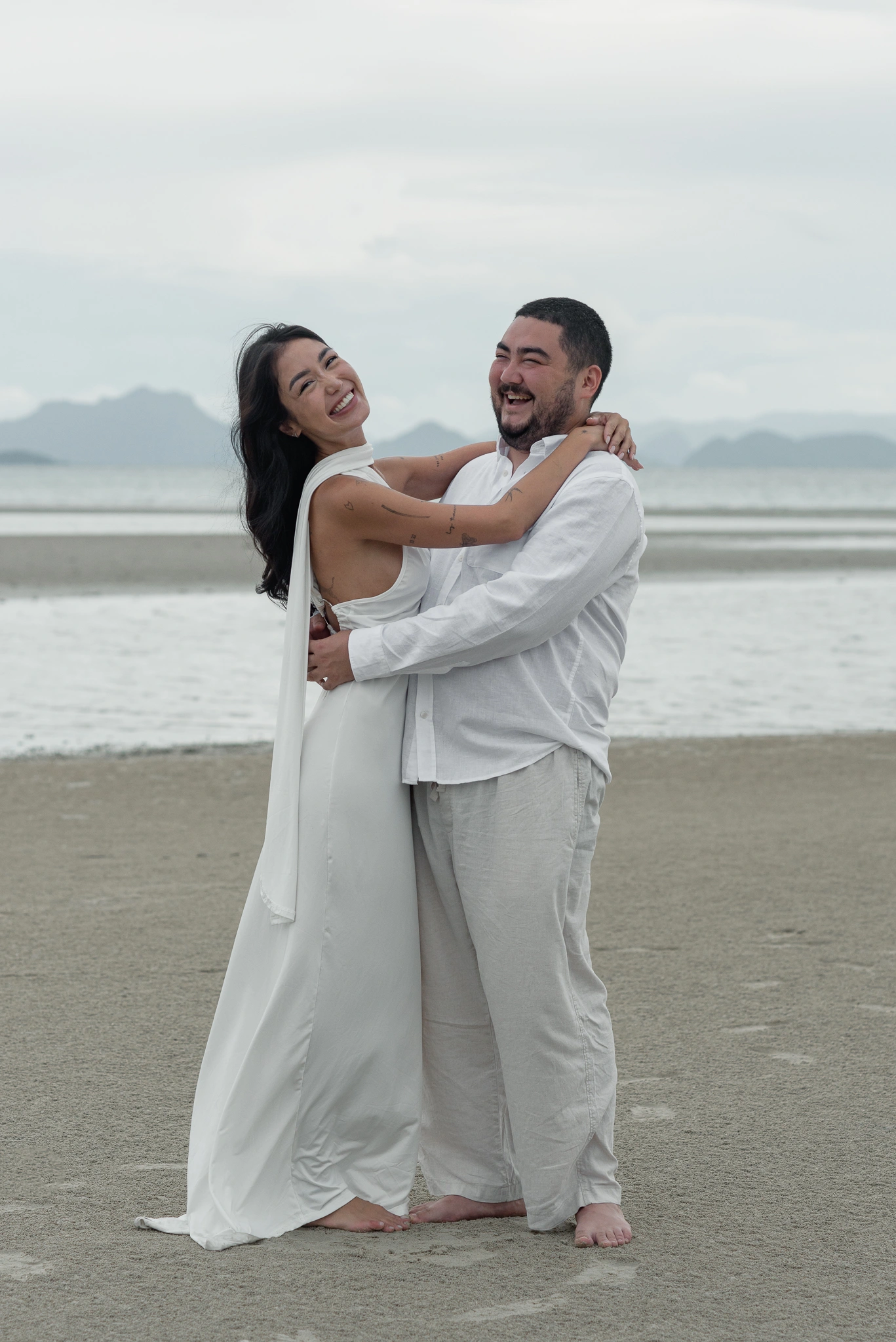 Intimate couple portrait by the sea