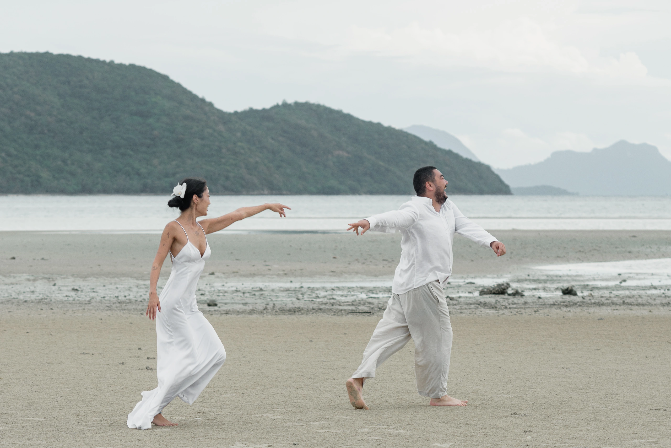 Wide beach scene from an intimate elopement session